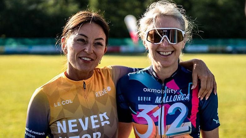 Juliet with a fellow rider at a cycling event